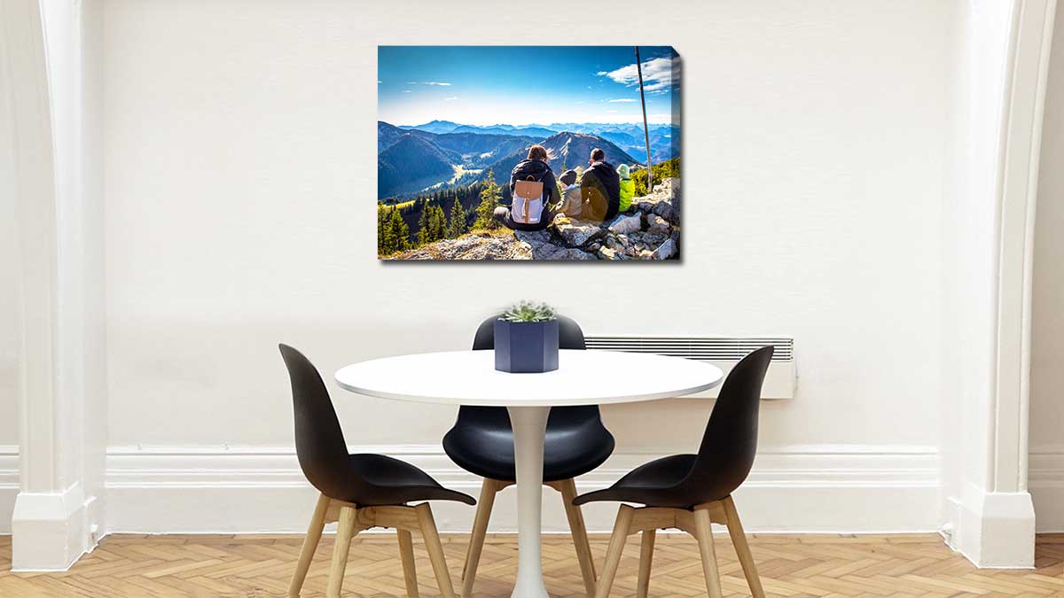 Canvas print on a bedroom wall featuring a photo of a family walk