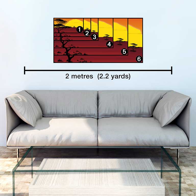 Image of panoramic photo prints hanging above a sofa with sizes